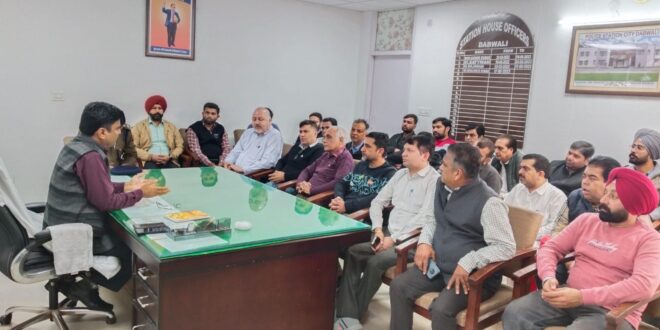 Dabwali Superintendent of Police Sumer Singh attending the meeting of medical store operators.
